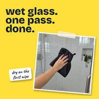 Wiping a wet glass shower door dry in one pass